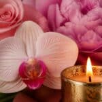 Pink orchid and candle symbolize remembrance, cremation services in St. Charles, MO