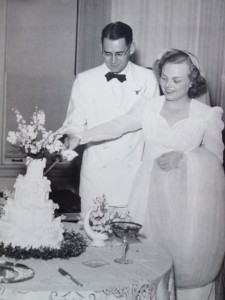 Mary and Charlie Hunt_cutting their wedding cake_1945
